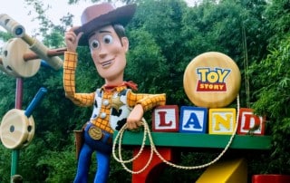 Gigantic Woody doll welcoming guests to the new Toy Story land in Disney's Hollywood Studios theme park.