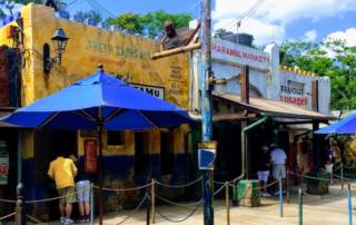A photo of restaurants in Disney's Animal Kingdom that is designed to look like an African marketplace.